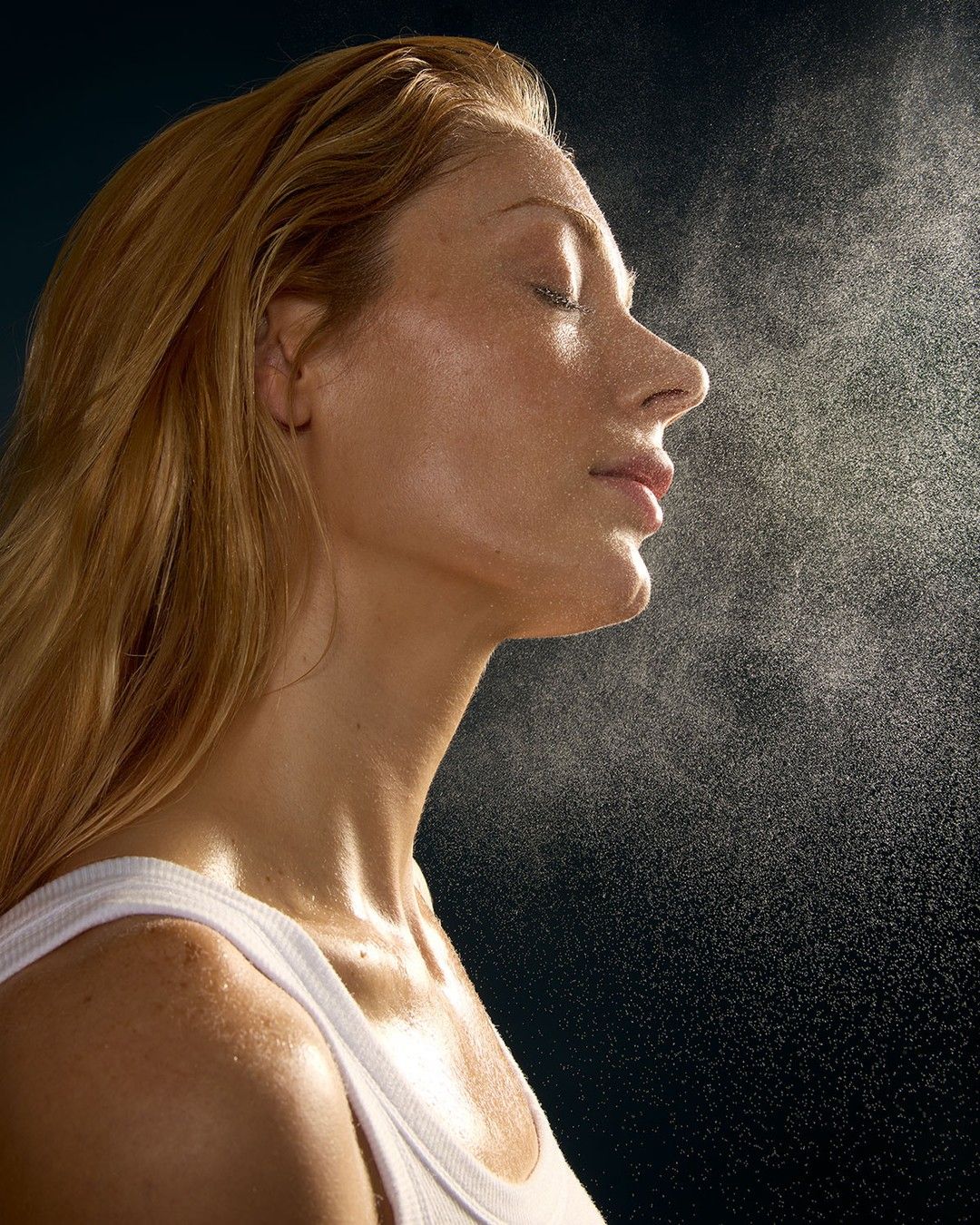 Woman sprayed by mist